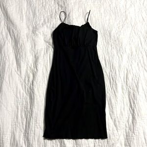 A mini dress with ruffles on the top